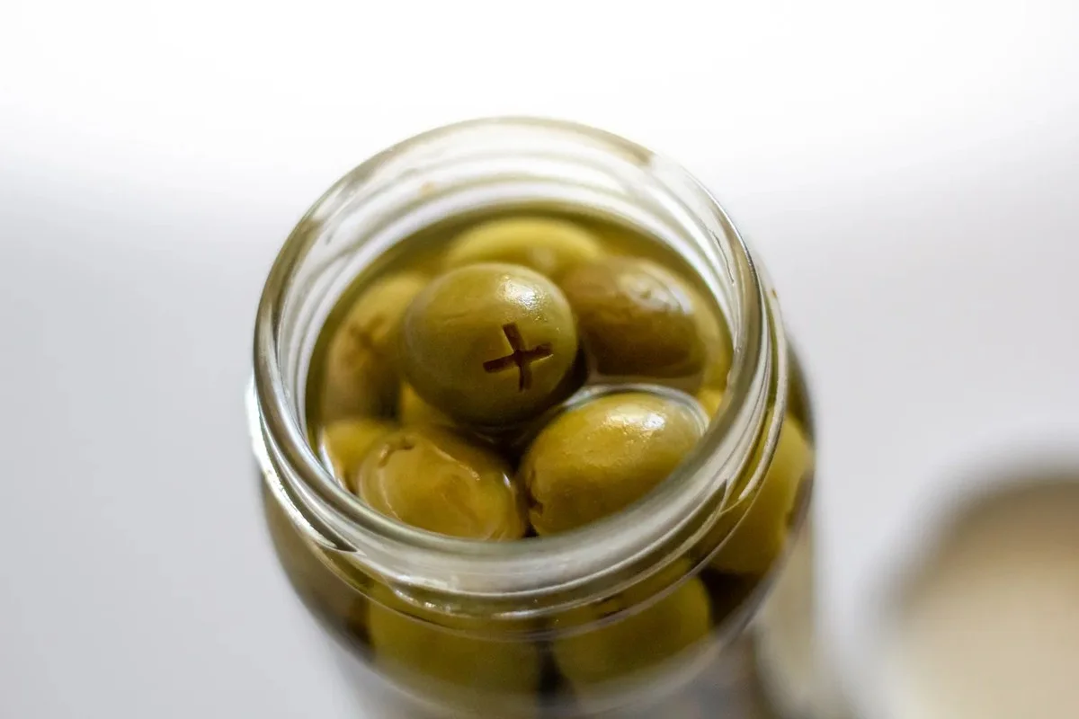 Waarom ervaren thuiskoks olijvensap in het slachthuis gooien: Verandert kip in een sappige droom