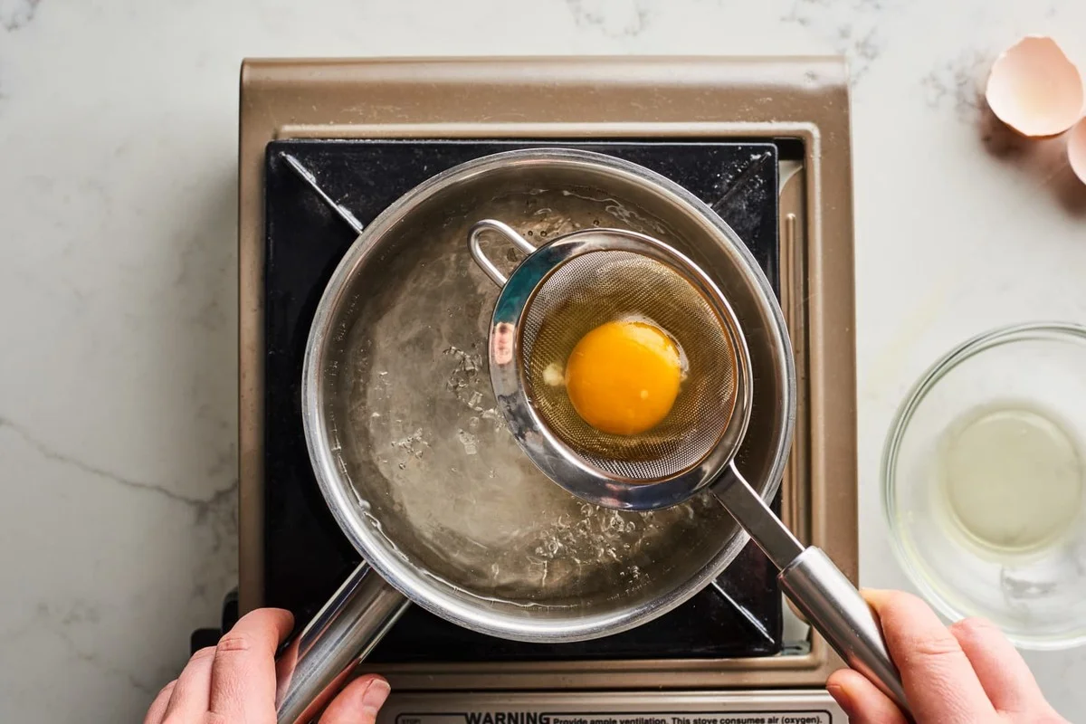 Waarom topkoks altijd azijn toevoegen aan kokend water met eieren - image 2